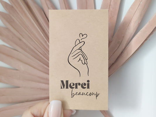 Sachets de graines à semer avec une main symbolisant un coeur coréen pour remercier ses invités