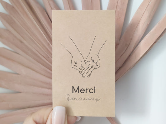 Sachets de graines merci beaucoup avec 2 mains qui tiennent un cœur dans leur paumes